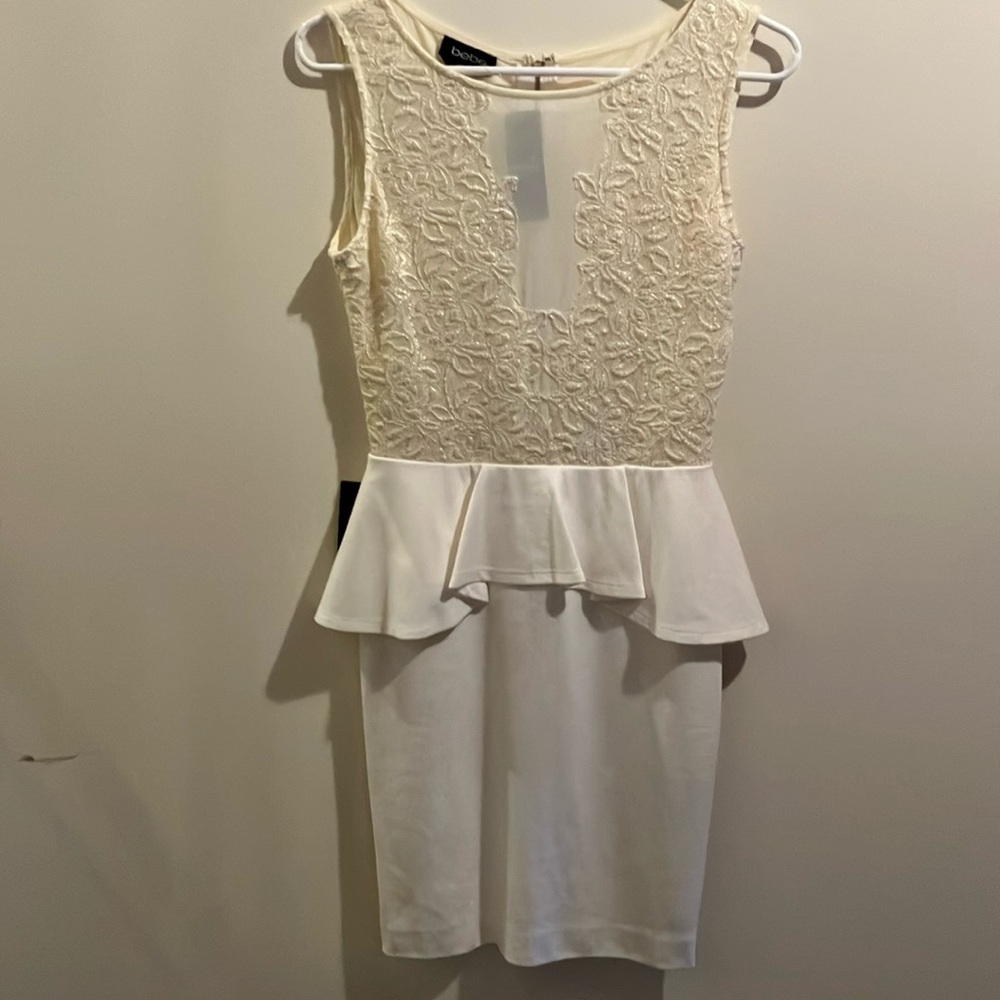 Elegant Cream Lace Peplum Dress